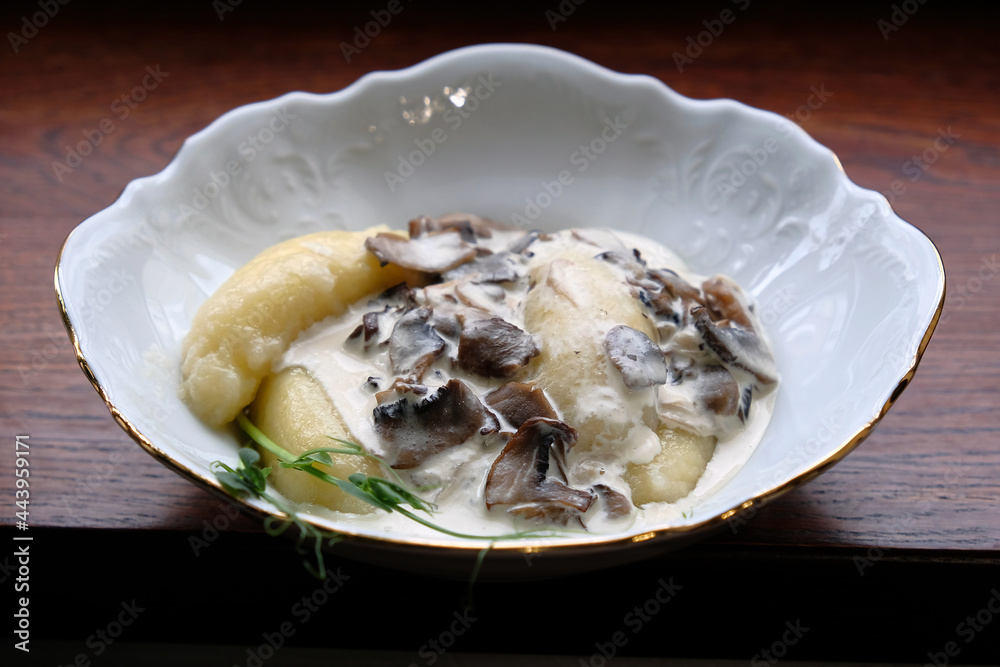 Ukrainian dumplings in mushroom sauce