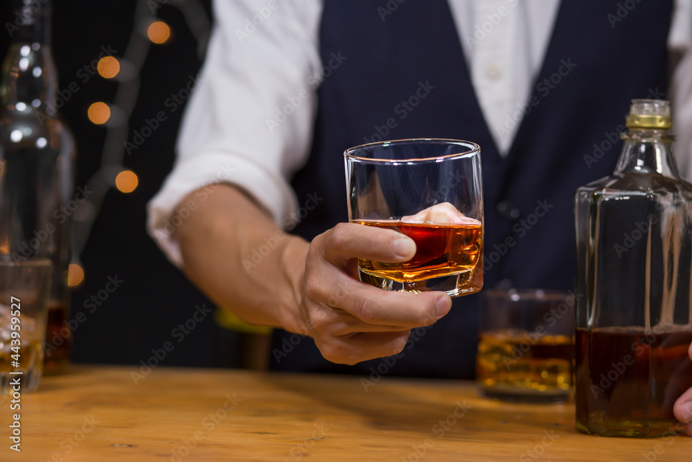 Bartender Serve Whiskey, on wood bar, 