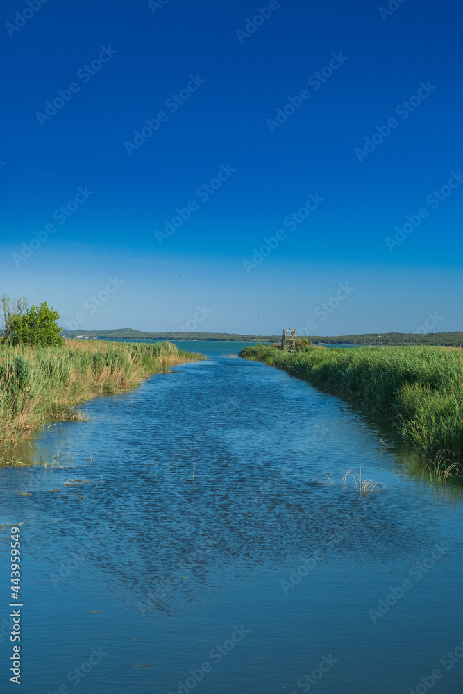 River in ornithological nature park Vrana lake (Vransko jezero) in Dalmatia, Croatia