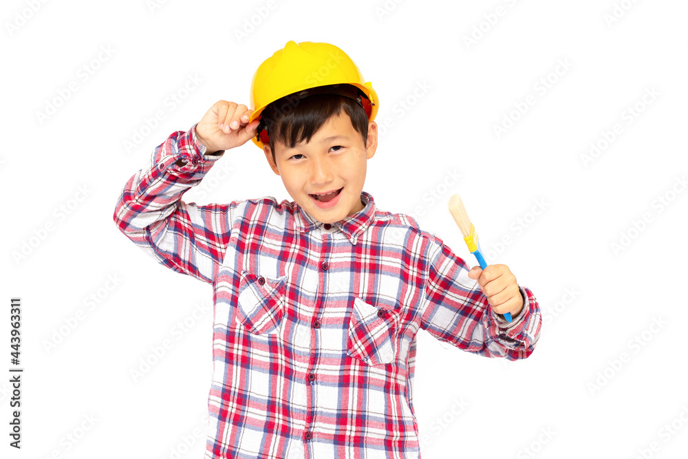 profession, future, childhood and people concept - smiling little boy in protective helmet with paint brush profession, future, childhood and people concept - smiling little boy in protective helmet with paint brush