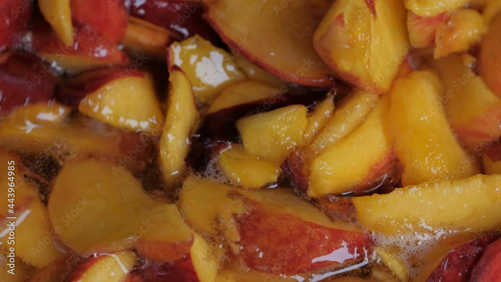 Making jam from ripe juicy sweet peach fruits close-up macro photography top view Making jam from ripe juicy sweet peach fruits close-up macro photography top view