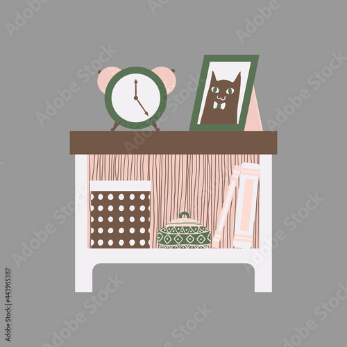 Clip art of nightstand with books, clock and chest in scandinavian style. Vector clip art of bedside table in cartoon style. Cozy furniture for home. Isolated on white background.