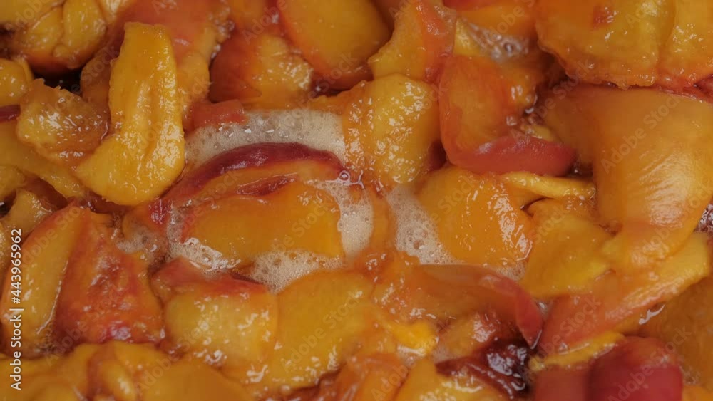 Making jam from ripe juicy sweet peach fruits close-up macro photography top view Making jam from ripe juicy sweet peach fruits close-up macro photography top view
