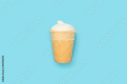 Ice cream sundae in a cup on a blue background
