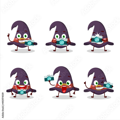 Photographer profession emoticon with witch hat cartoon character