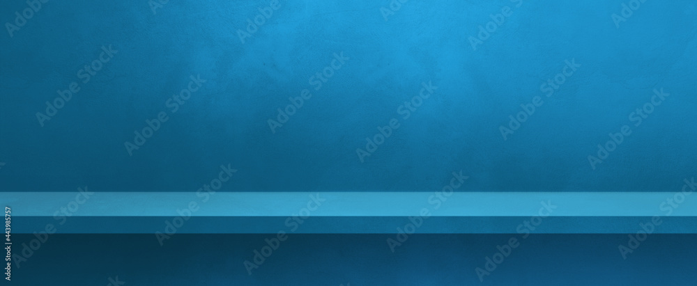 Empty shelf on a blue wall. Background template. Horizontal banner Empty shelf on a blue wall. Background template. Horizontal banner
