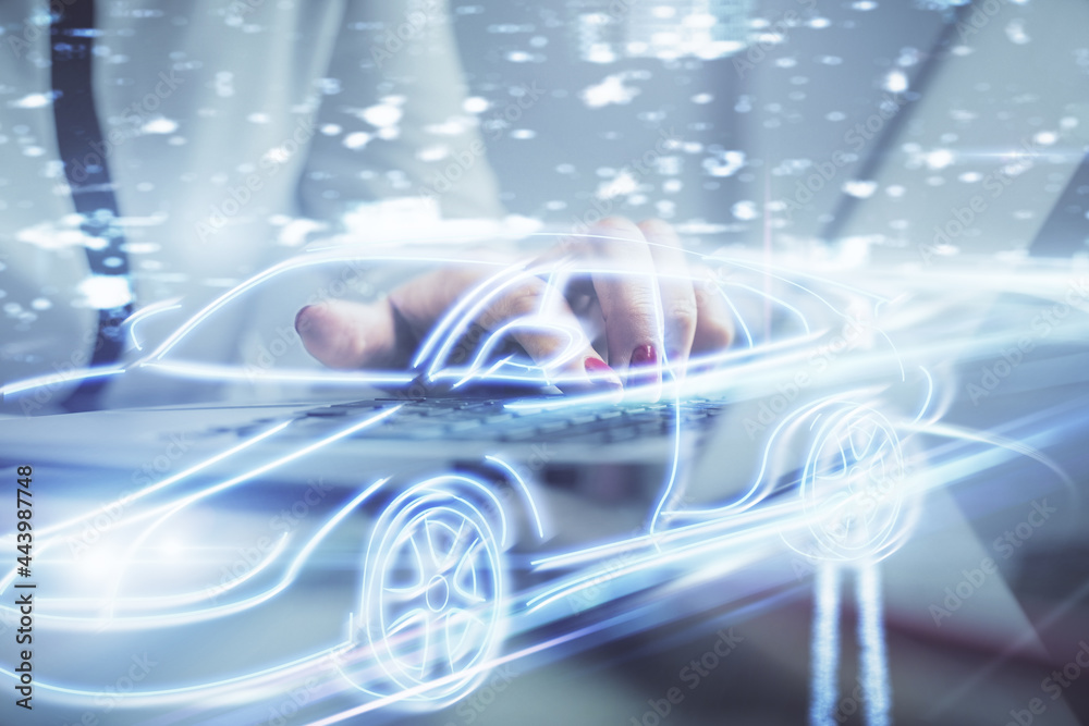 Double exposure of woman hands typing on computer and automobile theme drawing. High Tech concept. Double exposure of woman hands typing on computer and automobile theme drawing. High Tech concept.