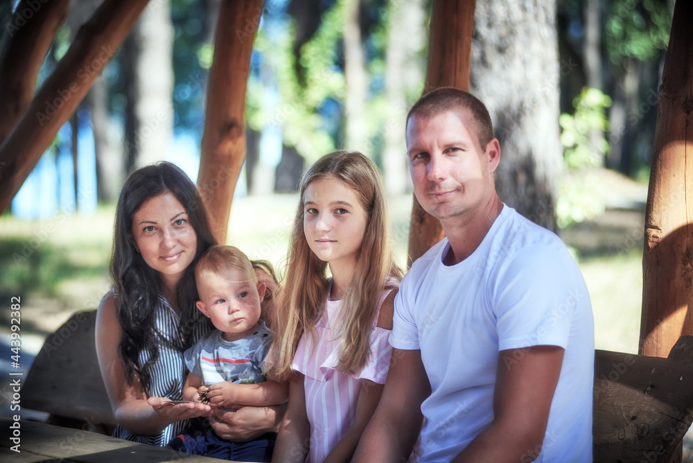 Outdoor portrait of family with two children Outdoor portrait of family with two children