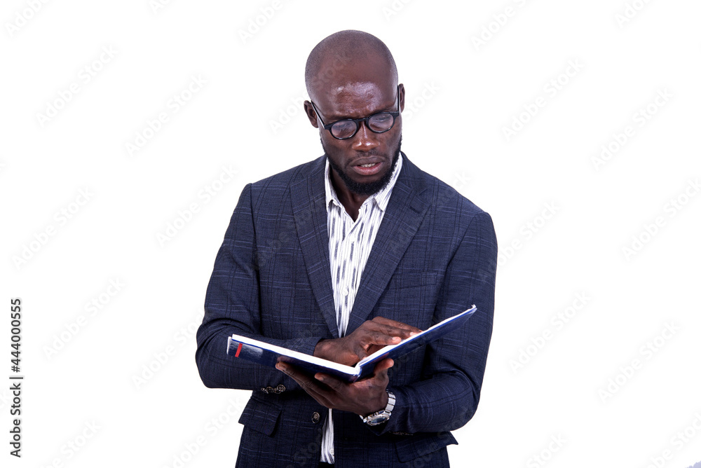portrait of a young businessman checking a folder. portrait of a young businessman checking a folder.