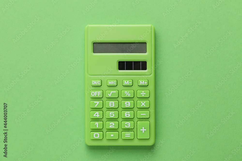 Green Calculator on Green background - obrazy, fototapety, plakaty 