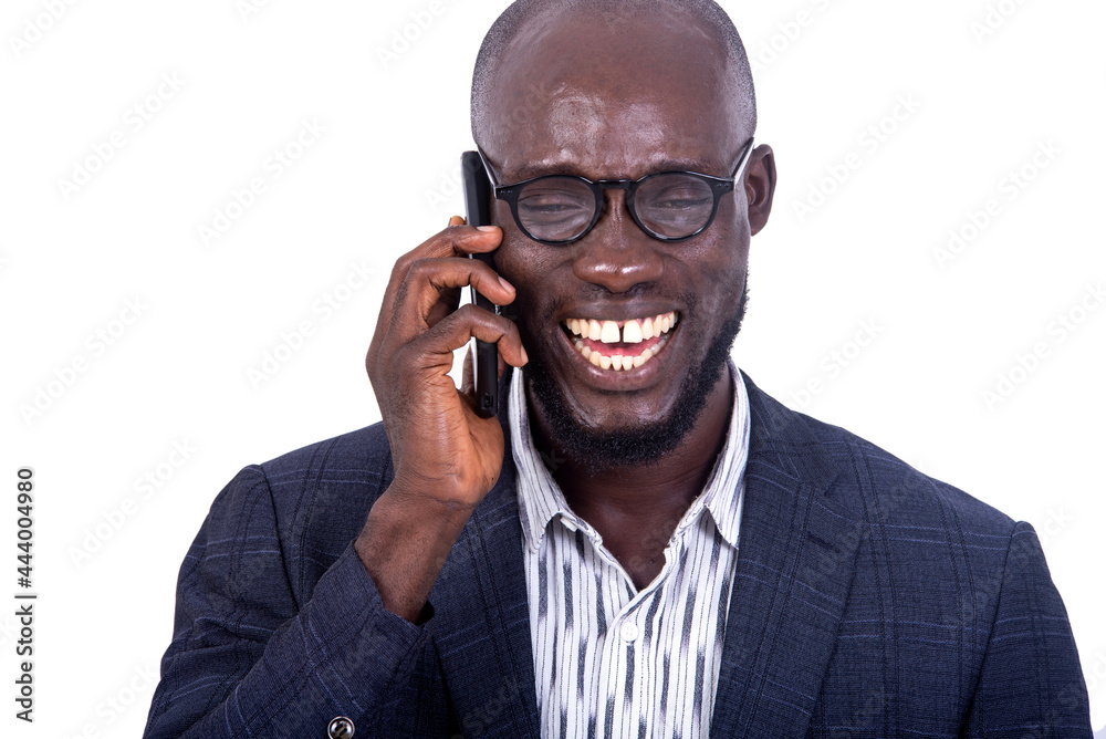 handsome businessman talking on mobile phone smiling. handsome businessman talking on mobile phone smiling.