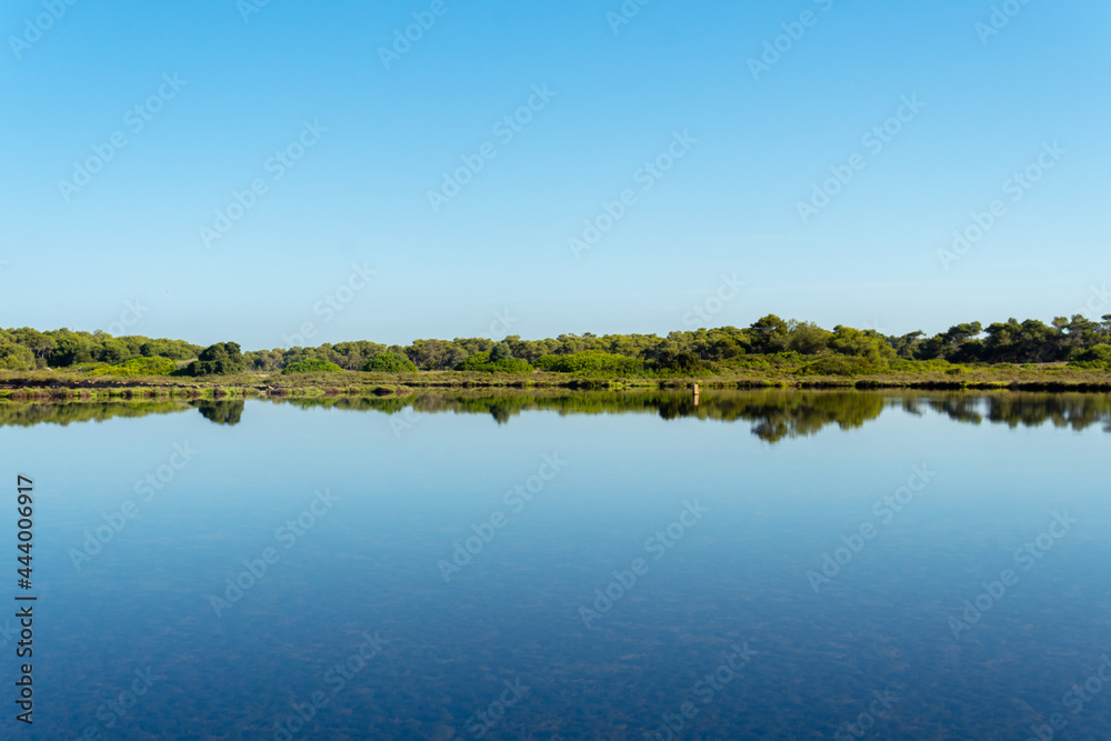 Fototapeta premium General view of Colonia de Sant Jordi town reflected