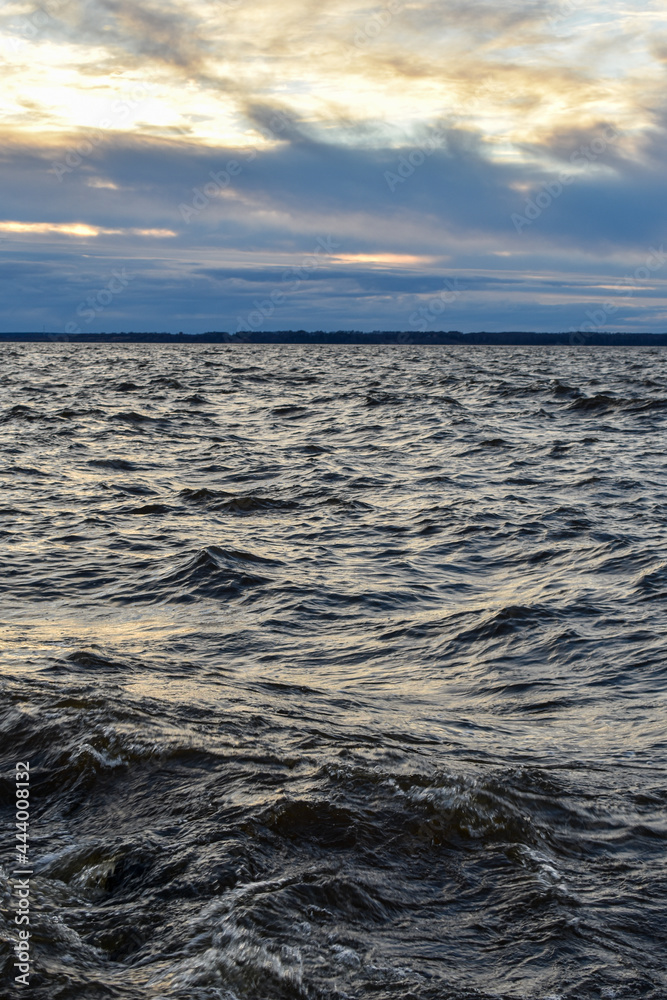 Fototapeta premium beautiful sunset and waves on the Volga River