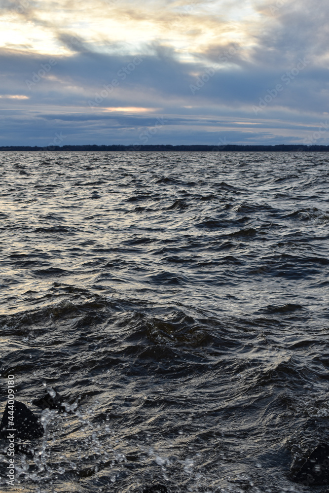 Fototapeta premium beautiful sunset and waves on the Volga River