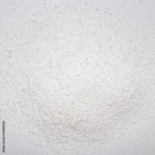 Citric acid white background.Citric acid crystal top view.