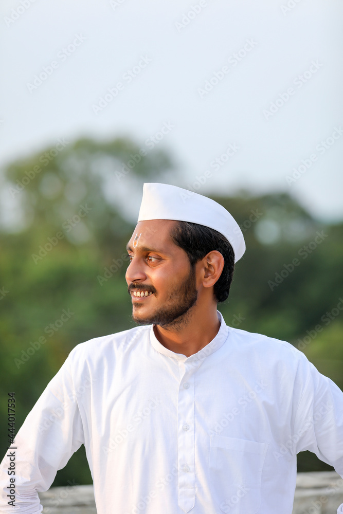 Young indian man (pilgrim) in traditional wear. Young indian man (pilgrim) in traditional wear.