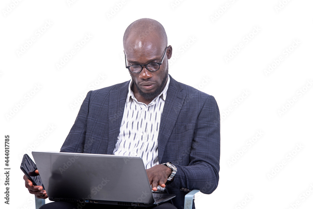 serious adult businessman working on laptop. serious adult businessman working on laptop.