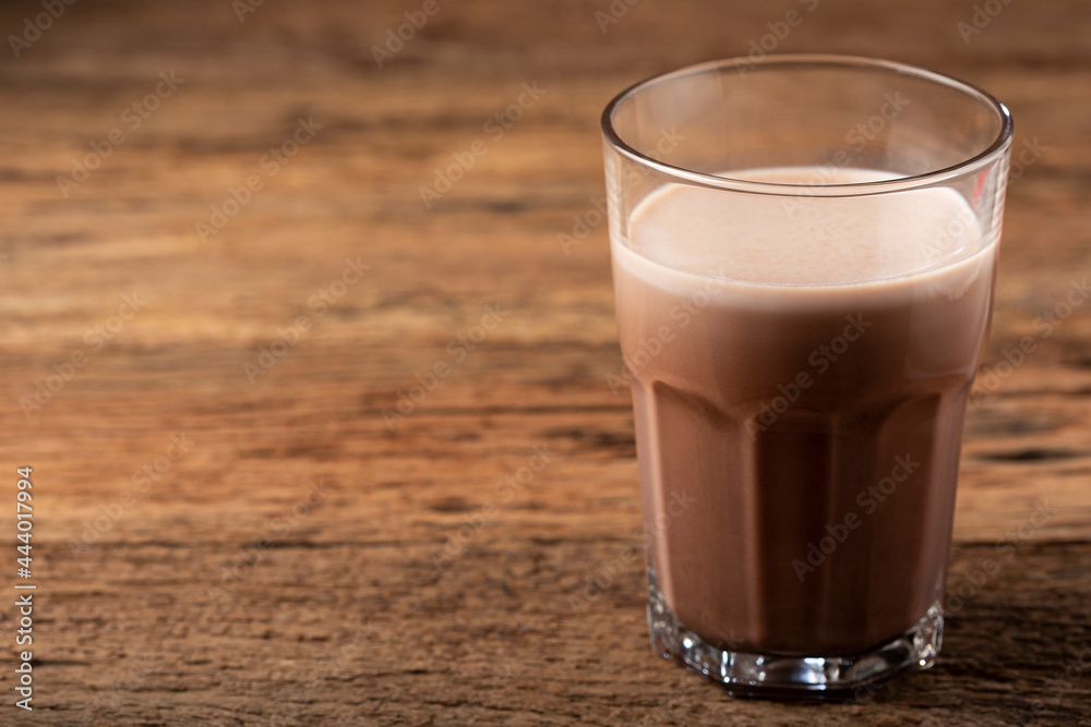 Glass with chocolate on the table. Glass with chocolate on the table.