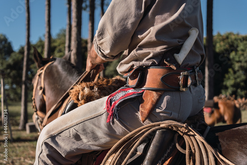 Фотография Local farmer riding his horse. Gaucho.
