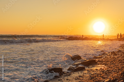 Dark blue waves against the beautiful orange sunset at the Black Sea  Anapa  Russia