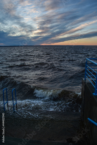 beautiful sunset and waves on the Volga River