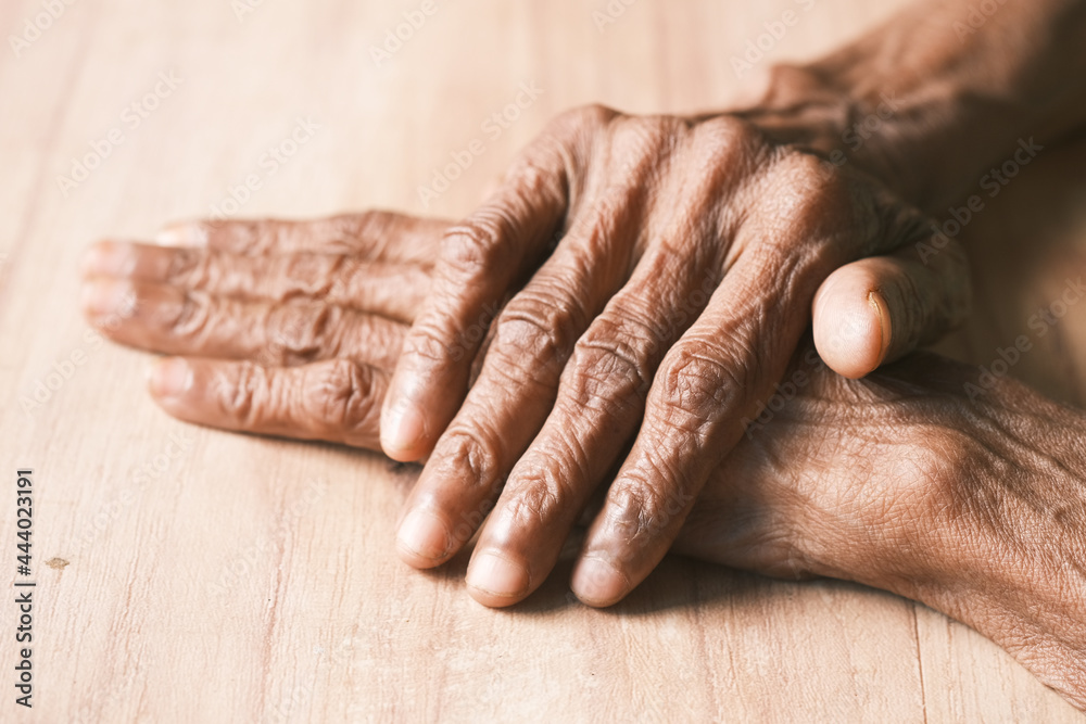 Fototapeta premium close up of hands of a elderly person