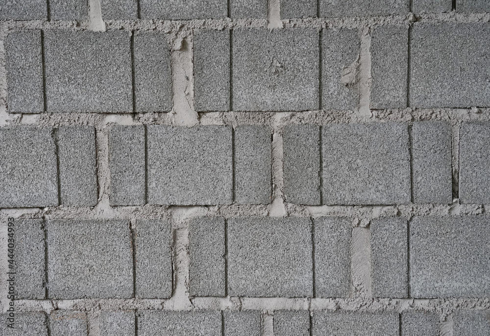 Obraz premium texture of bricks blocks wall construction before plastering