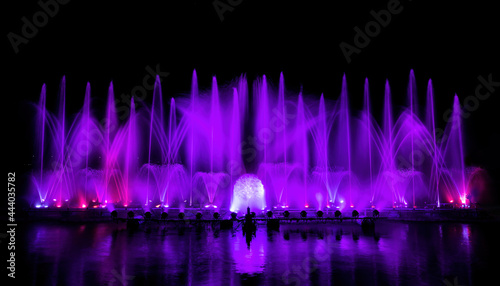 The colorful fountain dancing in celebration of year with dark night sky background