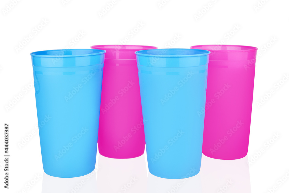 Blue pink empty plastic cups white background isolated close up, four disposable blank drinking glasses, party beverage, cocktail, water, coffee mug, tea, fruit juice, tumbler design, picnic utensil Blue pink empty plastic cups white background isolated close up, four disposable blank drinking glasses, party beverage, cocktail, water, coffee mug, tea, fruit juice, tumbler design, picnic utensil