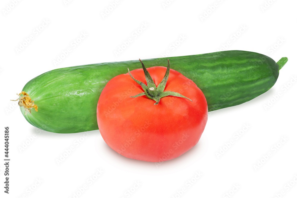 Tomato and cucumber on an isolated white background. Tomato and cucumber on an isolated white background.