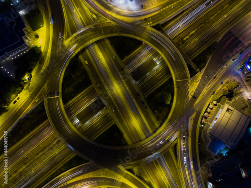 Car light trails at a traffic roundabout