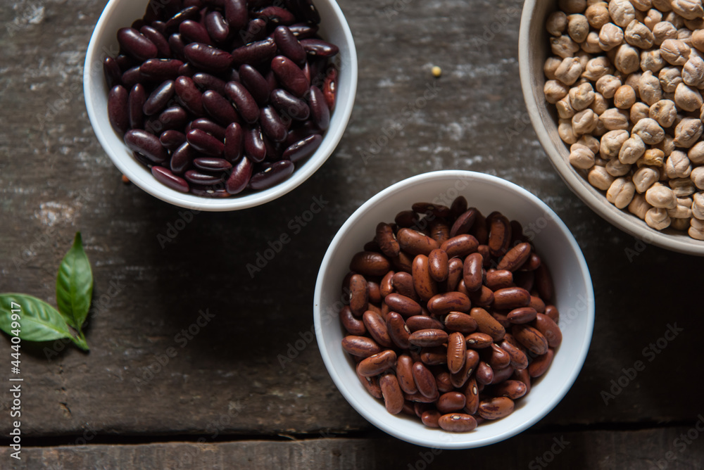 Close up of kidney beans in a bowl with use of selective focus on a background Close up of kidney beans in a bowl with use of selective focus on a background