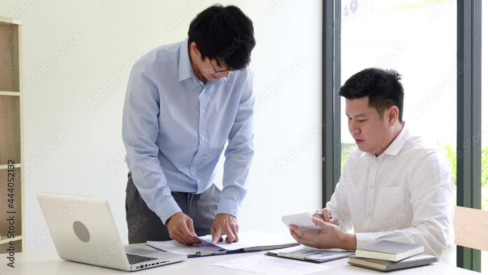 Business meeting, Brainstorm team, Analyzing charts to plan strategies. Business meeting, Brainstorm team, Analyzing charts to plan strategies.