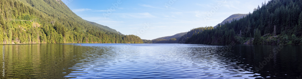 Panoramic View of Buntzen Lake surrounded by Canadian Mountain Landscape. Sunny Summer Evening. Located in Anmore, Vancouver, British Columbia, Canada. Nature Background Panorama