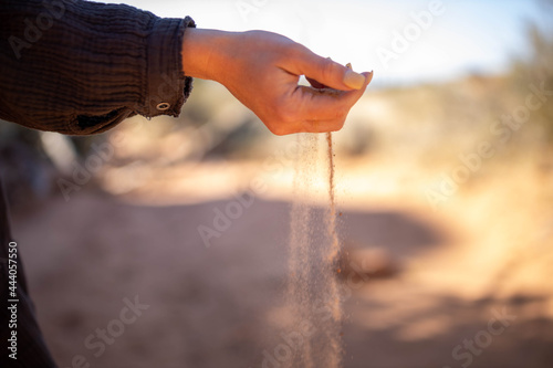 sand falling through fingers