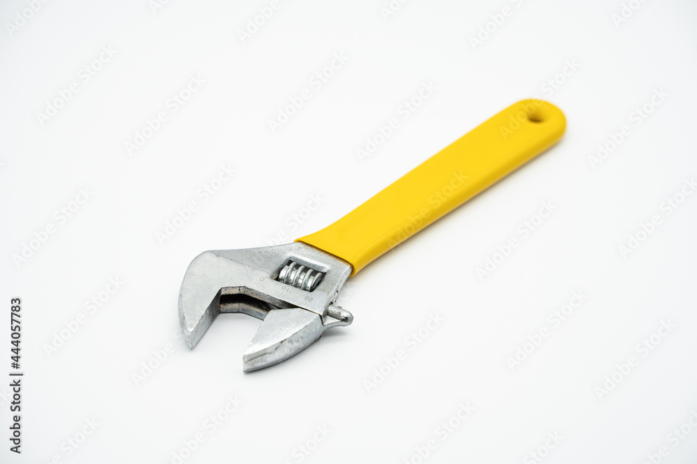 Household tool: monkey spanner with yellow handle Household tool: monkey spanner with yellow handle