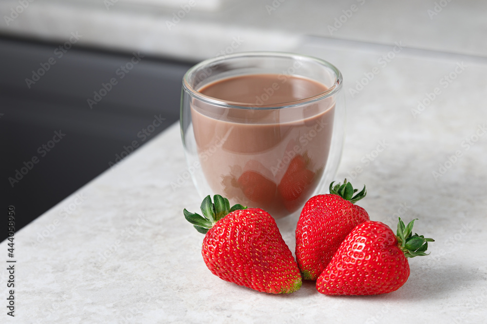 cocoa with strawberries on the kitchen table
