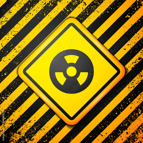 Black Radioactive icon isolated on yellow background. Radioactive toxic symbol. Radiation Hazard sign. Warning sign. Vector