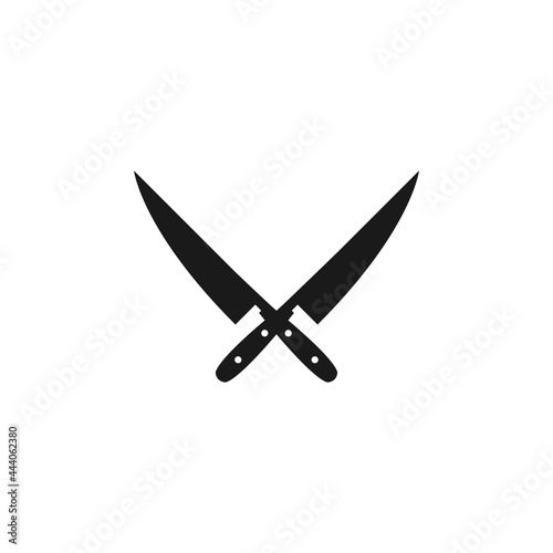 Black crossed knives. BBQ and grill tools. Barbeque cutlery. Kitchen utensil.