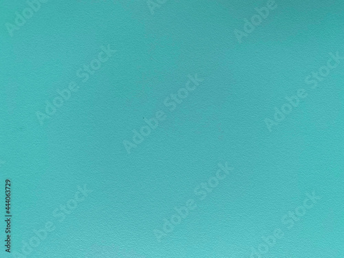 Seamless texture of blue ocean color cement wall a rough surface, with space for text, for a background.