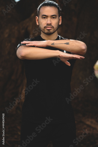 chinese man practicing kung fu in the park