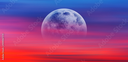 Fototapeta Naklejka Na Ścianę i Meble -  Night sky with moon in the  clouds at amazing sunset 