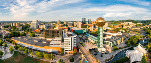 Aerial panorama of Knoxville, Tennessee skyline on a late sunny afternoon, viewed from above Worlds Fair Park. Knoxville is the county seat of Knox County in the U.S. state of Tennessee. photo