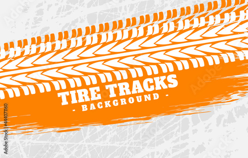 Orange tire tracks imprint background 
