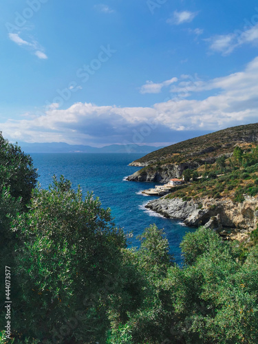 Fototapeta Naklejka Na Ścianę i Meble -  Panoramic views of the picturesque landscape with cliffs, blue Aegean sea and greenery. Turkey, Kusadasi. Europe.