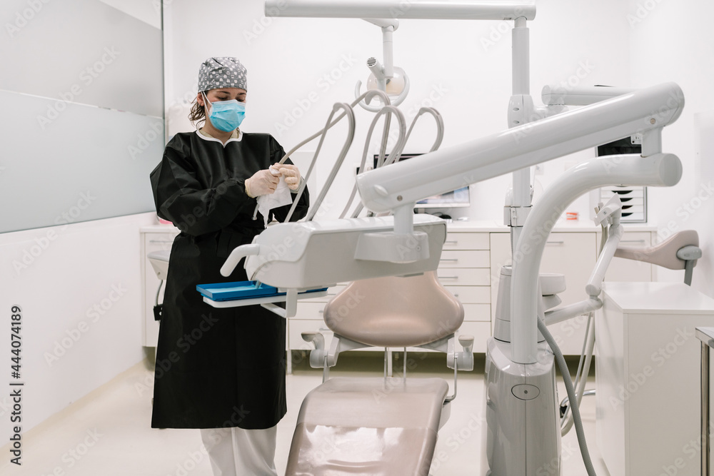 Assistant cleaning the dental hospital Assistant cleaning the dental hospital