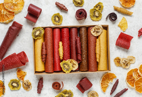 Fruit marshmallow. Berry pastille on light background. Pastille and fruit chips, frips