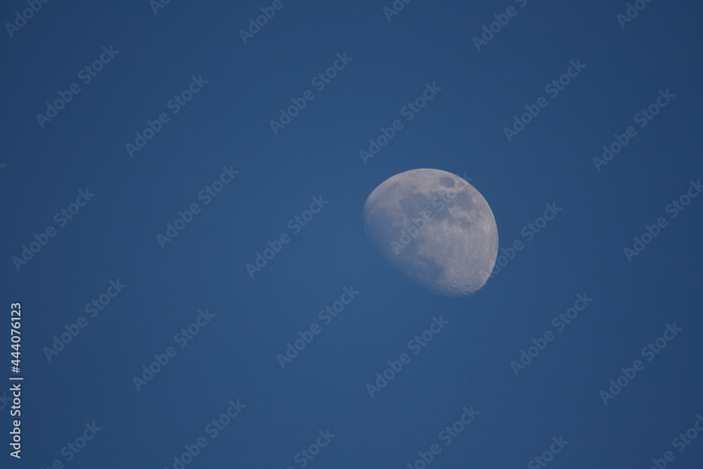 Partial moon in the evening sky replacement graphic resource
