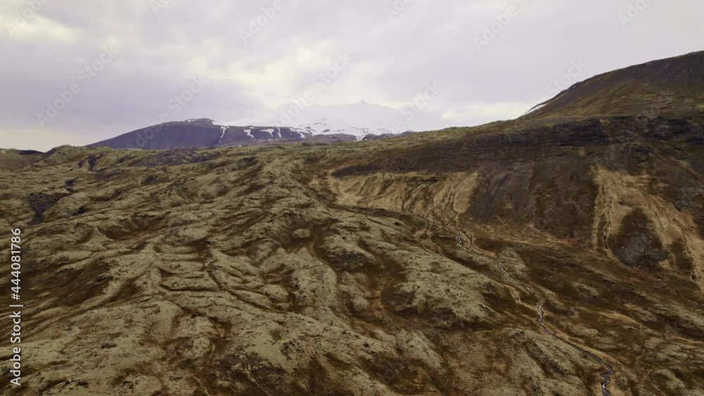 Awesome Drone Shot of Snowy Mountain and White Clouds in Background Awesome Drone Shot of Snowy Mountain and White Clouds in Background
