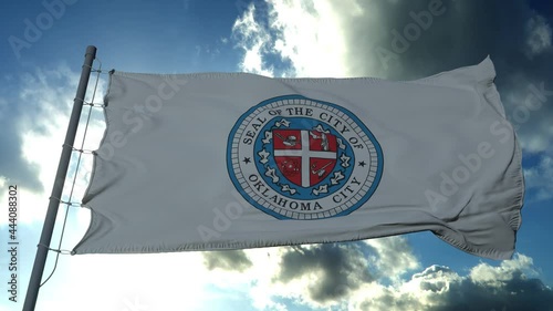 Flag of Oklahoma, city of United States of America, waving at wind in blue sky photo